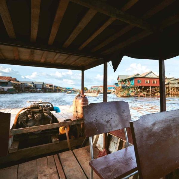 Morning Siem Reap floating village tour [Siem Reap floating village Kampong Phluk guided tour] a view of the rear of the boat