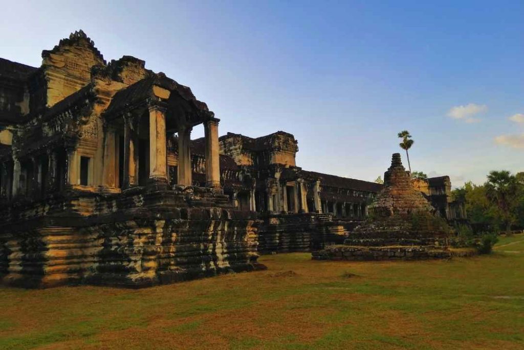 Watching the sunset from the back entrance of Angkor Wat is a lesser-known but equally mesmerizing experience.