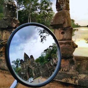 Siem Reap HomeStay 2 Day Tour - reflection of the Angkor Gate entering Angkor Thom