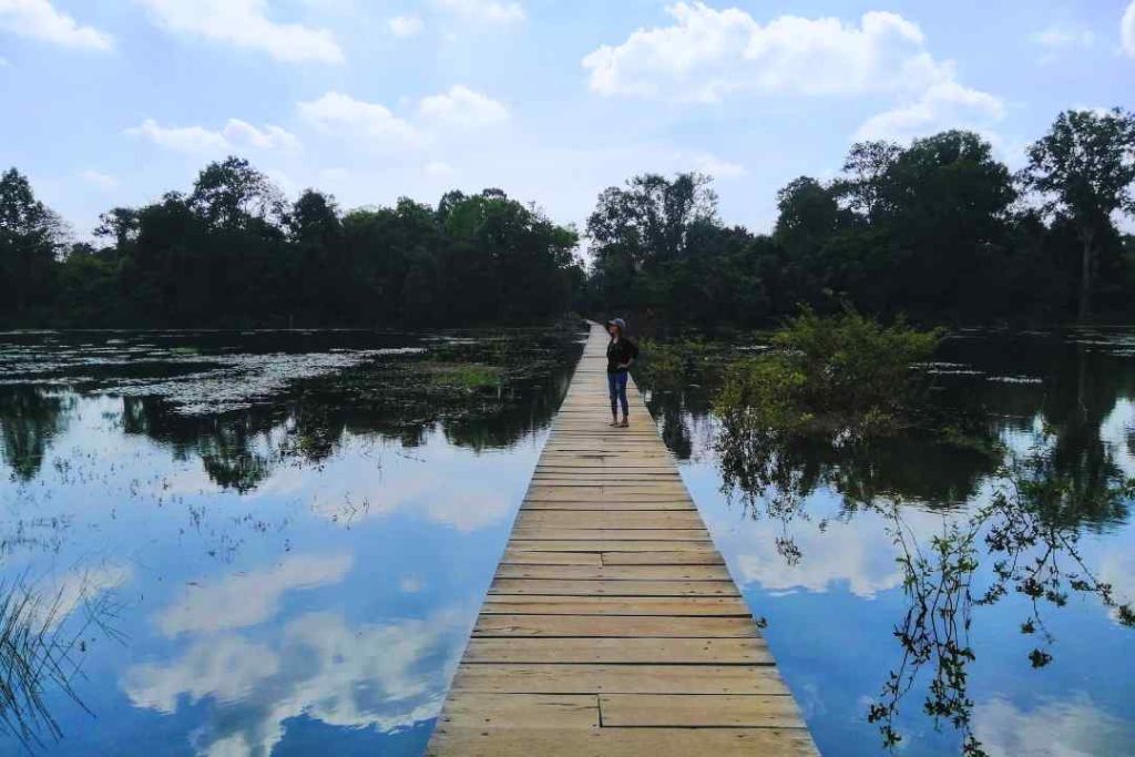 Crossing the Lake at Neak Pean Temple - The old bridge