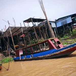 Drift along watery alleyways to discover the floating village's stilt homes and culture.