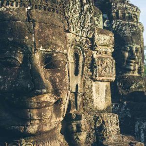 See the iconic carved faces of Bayon temple up close
