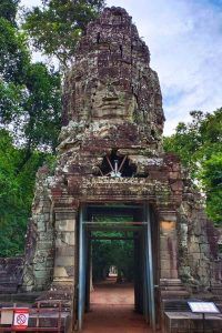 Exclusive Angkor Wat Tour Experience entering Ta Prohm