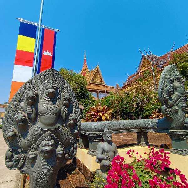 Sightseeing Siem Reap - Sacred Naga Guardian at a Living Cambodian Temple