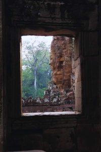 2.5-Day Siem Reap Journey Ancient stone faces of Bayon emerge from morning mist while visitors are still asleep