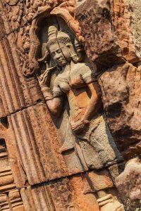 Sacred dancers carved in pink stone tell ancient stories at Banteay Srei - part of our 2.5-Day Siem Reap Journey