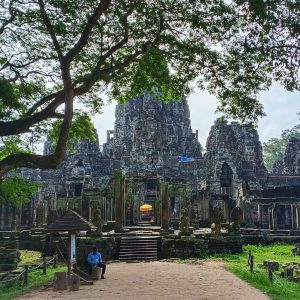 Bayon’s 216 stone faces watch over your Angkor Wat Small Circuit Tour with timeless smiles
