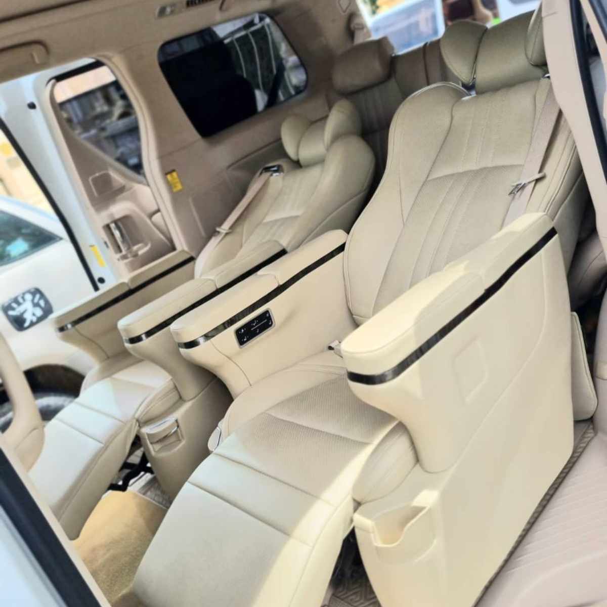 First class comfort Private Siem Reap to Phnom Penh taxi service interior showing spacious seating for five passengers